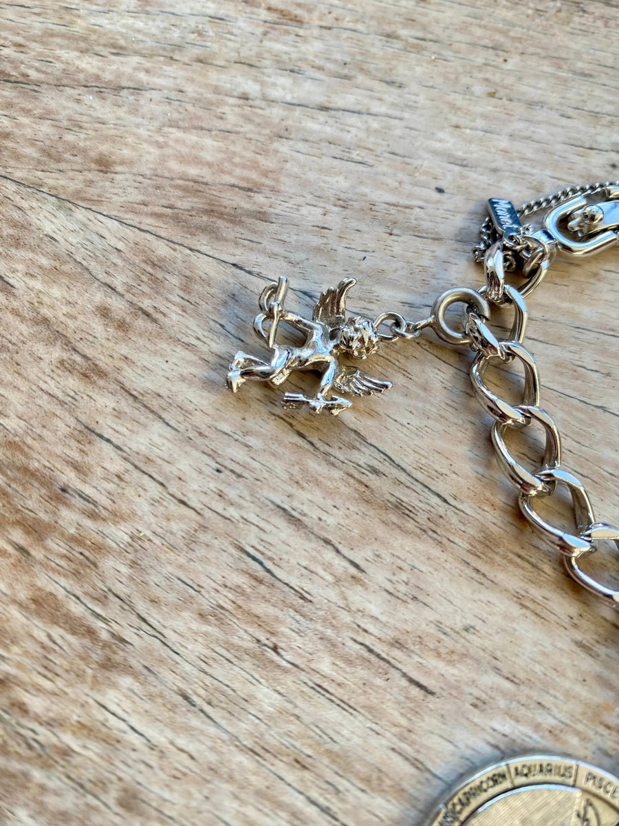 Monet Vintage Pisces Zodiac Bracelet 1970s, silver plated Jagged Metal 