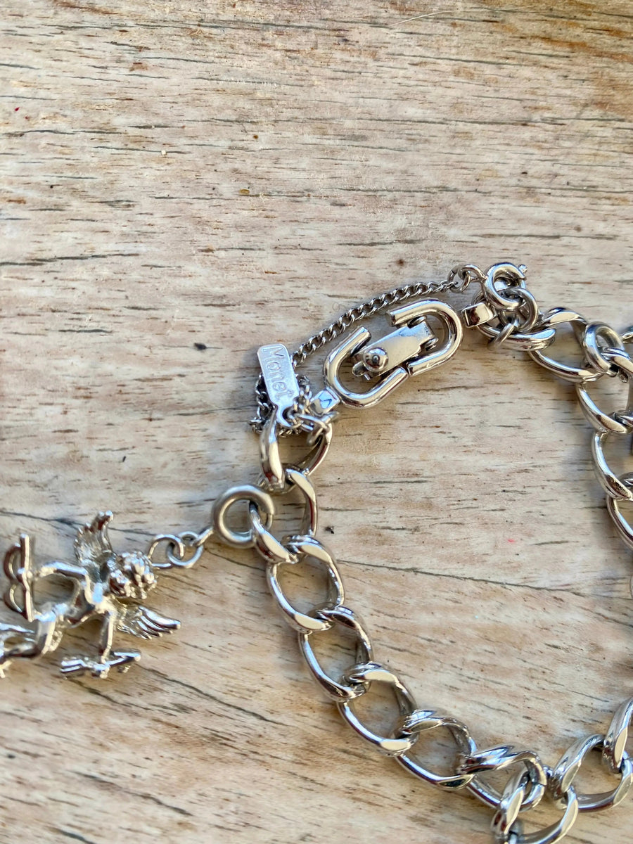 Monet Vintage Pisces Zodiac Bracelet 1970s, silver plated Jagged Metal 